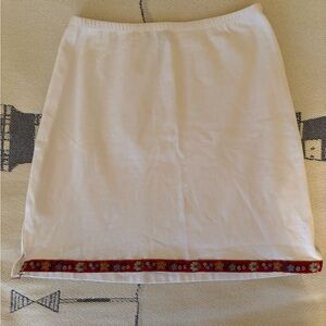 White Skirt with Red Floral Trim